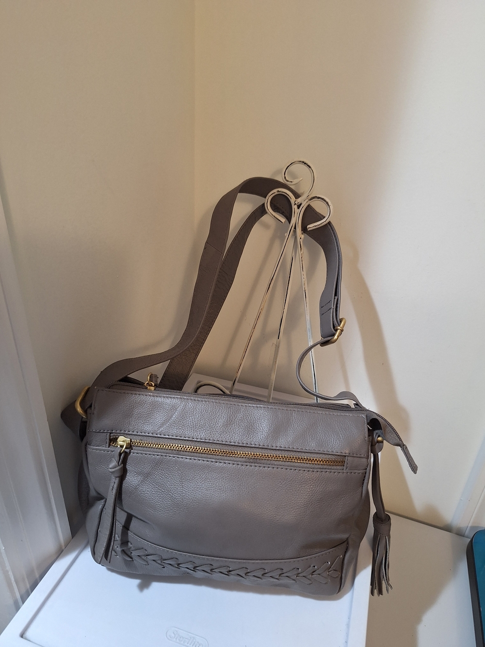 Taupe Leather Crossbody Bag with Tassel and Front Zip